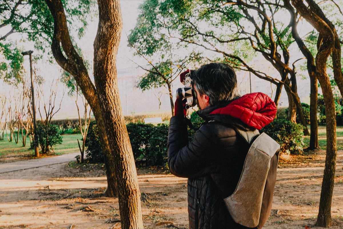 Checking a shot on a film camera